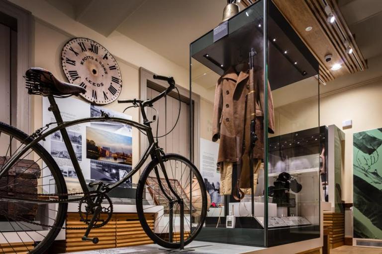 Objects including an old fashioned bicycle in the Civil War gallery
